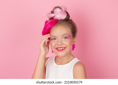 Charming Little Girl With Pink Hairstyle And Pink Makeup. Tween Young Model Posing On Pink Background.