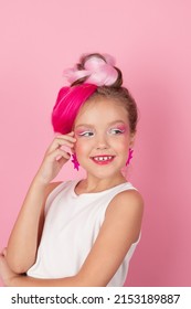 Charming Little Girl With Pink Hairstyle And Pink Makeup. Tween Young Model Posing On Pink Background.