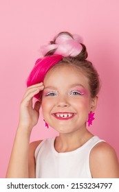 Charming Little Girl With Pink Hairstyle And Pink Makeup. Tween Young Model Posing On Pink Background.