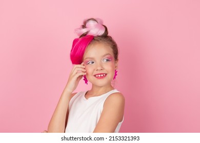 Charming Little Girl With Pink Hairstyle And Pink Makeup. Tween Young Model Posing On Pink Background.