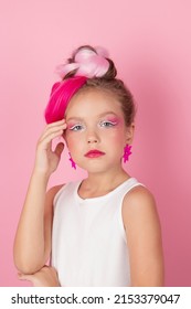 Charming Little Girl With Pink Hairstyle And Pink Makeup. Tween Young Model Posing On Pink Background.