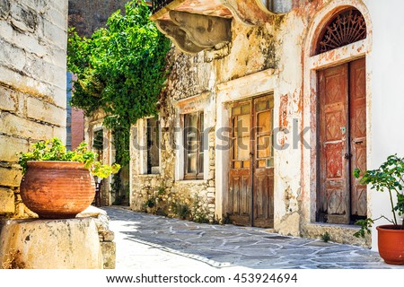 charming narrow streets of traditional greek villages . Naxos island , Cyclades, Greece