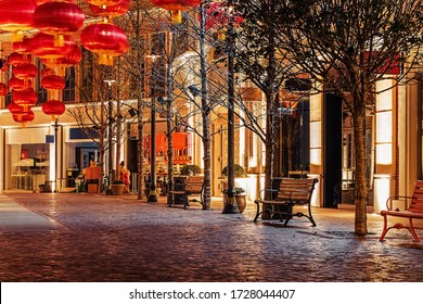 Charming Night Street With Shopping Lights And Chinese Lanterns. Photo With Blur In Motion And Soft Focus. Empty Hong Kong Central Street. 