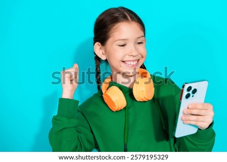 Similar – Image, Stock Photo Preteen girl in hoodie standing near green trees