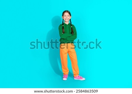 Similar – Image, Stock Photo Preteen girl in hoodie standing near green trees