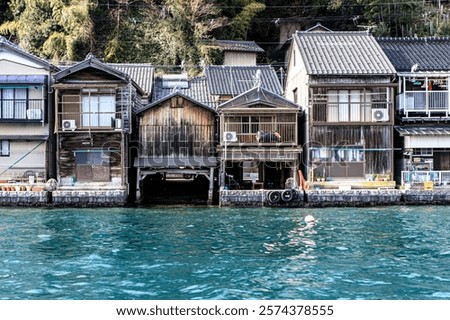 Similar – Image, Stock Photo Wooden boathouses built on the Mecklenburg Lake District on the banks of the Müritz River