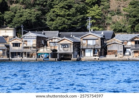 Similar – Image, Stock Photo Wooden boathouses built on the Mecklenburg Lake District on the banks of the Müritz River