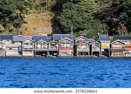 Similar – Image, Stock Photo Wooden boathouses built on the Mecklenburg Lake District on the banks of the Müritz River