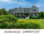 Charming two-story family house with well-maintained landscaping in Newton, Massachusetts, USA