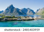 Charming typical fishing village in Norway - lofotens - Sakrisoy. Aerial view. Summer video. Breathtaking winter landscape. Lofoten