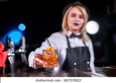 Charming Woman Mixologist Makes A Cocktail