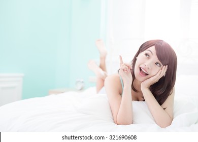 Charming Woman Smile Face Close Up And She Lying On The Bed In The Morning , Asian Girl