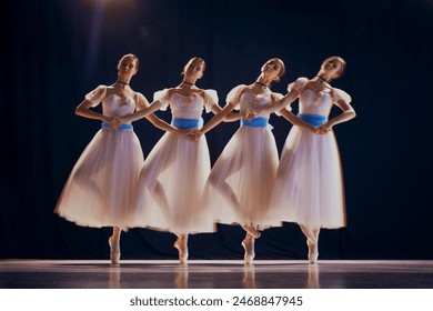 Charming young girls, ballet dancers in white tutus with blue bows on pointe dancing in motion on stage. Photo with motion blur effect. Concept of beauty, classic and modernity, contemporary art. Ad - Powered by Shutterstock