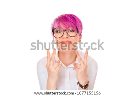 Charming young millennial girl with trendy hairstyle wearing modern glasses and showing two fingers with both hands looking happily at camera on white. Peace, victory sign with hands gesture concept