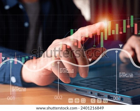 Chart and data analysis for business concept. Businessman implemented a robust CRM strategy, manage the finance report platform and monitor the growth graph trend. Finger point visual chart analytic.