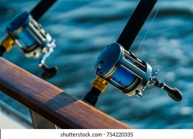Charter deep sea fishing gear at sunset