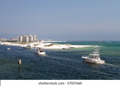 Charter Fishing Boats Enter Destin Harbor, Florida.