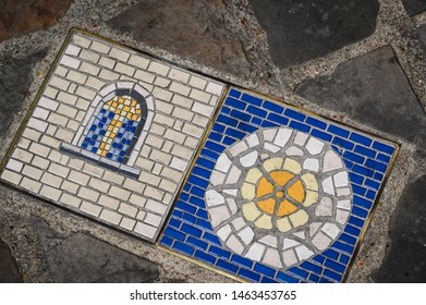 Chartres, France - Jul 2019: street tiles representing the  Cathedral of Notre Dame