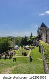CHARTRES, FRANCE - JUNE 1, 2019: Chartres 1254 - medieval festival taking place in Chartres. Festival Jardins de l'Eveche or Maze garden behind the cathedral.