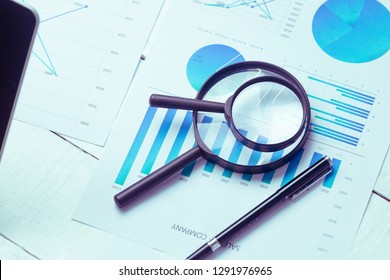 Charts And Graphs Are Placed On The Desks, Data, And Statistical Performance Of The Company In The Past Year.