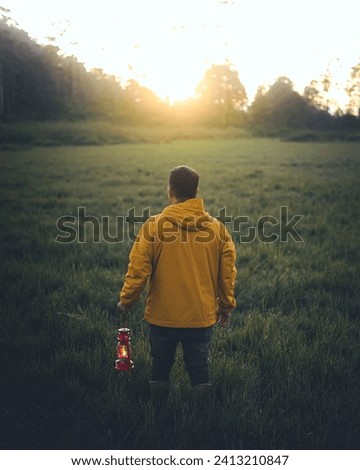 chasing the Sunrise with lantern in hand