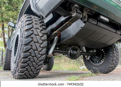 Chassis Off Road Vehicle In The Parking Lot. The Undercarriage Of Terrain Car On Way In Nature. 