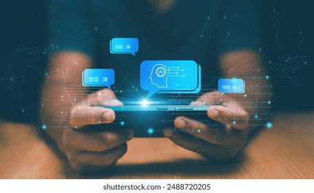 Chat with AI or Artificial Intelligence technology, Businessman using smartphone for chatting online with AI or chatbot. Futuristic technology transformation, Online automation chatbot. - Powered by Shutterstock