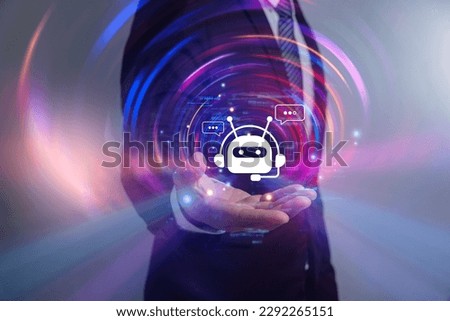 Chat bot with AI or Artificial Intelligence technology, Hand of businessman chatting with smart AI or artificial intelligence, Automate chatbot.