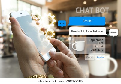 Chat bot and future marketing concept . Customer hand holding smart phone for reorder coffee and popup out phone screen with automatic chatbot message screen , coffee shop background