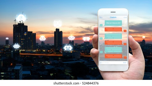 Chat Bot , Robo Everywhere And Future Marketing Concept. Human Hand Holding White Phone , Application Ui And Robot Icons With City Sunset Background