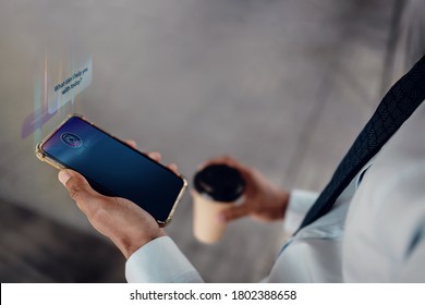 Chat Bot Technology Concept. Young Businessman Using Mobile Phone To Make Conversation with an Artificial Intelligence . Virtual Assistant for Customer Support Information - Shutterstock ID 1802388658