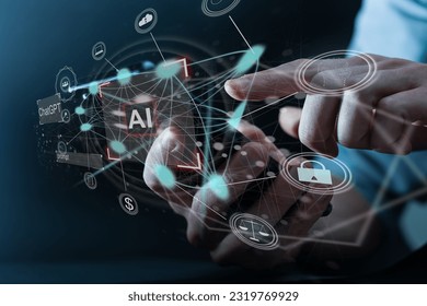 Chat concept. Business person chatting with a smart AI using an artificial intelligence chatbot developed by AI. Artificial intelligence system support is the future. - Shutterstock ID 2319769929
