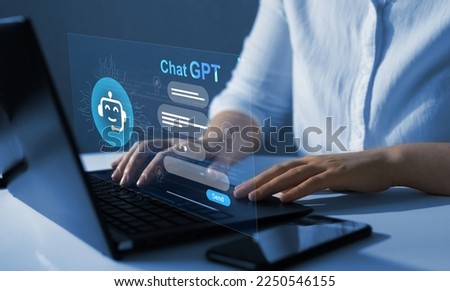 Chat GPT concept.
Business person chatting with a smart AI  using an artificial intelligence chatbot developed by OpenAI. Artificial intelligence system support is the future.