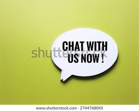 Chat With Us Now Text Inside White Speech Bubble on Lime Green Background Representing Online Customer Support and Digital Communication. 