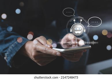 Chatbot assistant conversation, Ai Artificial Intelligence technology concept. Woman chatting with chatbot via mobile smart phone application with virtual chatbot, customer service