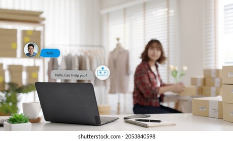 Chatbot Conversation On Laptop Screen App Interface With Artificial Intelligence Technology Providing Virtual Robotic Assistant Customer Support And Information For Small Business SME B2C Concept.