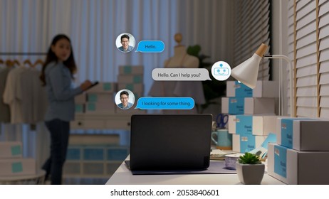 Chatbot Conversation On Laptop Screen App Interface With Artificial Intelligence Technology Providing Virtual Robotic Assistant Customer Support And Information For Small Business SME B2C Concept.