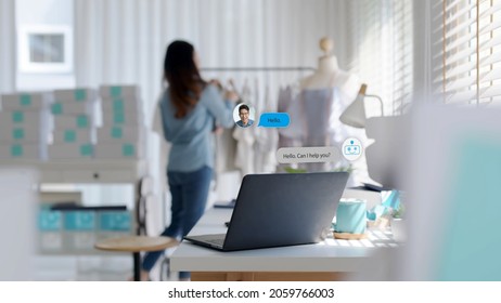 Chatbot Conversation On Laptop Screen App Interface With Artificial Intelligence Technology Providing Virtual Robotic Assistant Customer Support And Information For Small Business SME B2C Concept.