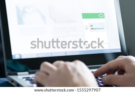 Chatbot or live chat with customer help assistant on business website. AI technology and conversation with automated messages. Client care and service. Online support and helpdesk on laptop screen.