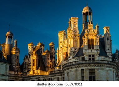 Chateau De Chambord At Sunset, France. This Renaissance Castle Is A Famous Landmark In The Loire Valley. Beautiful Rooftop Of The French Castle In Sunlight. Luxury Decorations Of The Old Palace.