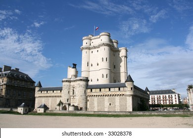 Chateau De Vincennes In Paris, France. Old Fortress With French National Flag.