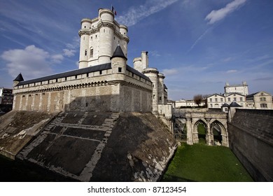 Chateau De Vincennes In Paris, France. Old Fortress With French National Flag.