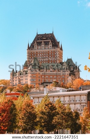 chateau Frontenac in quebec city with trees and a blue sky