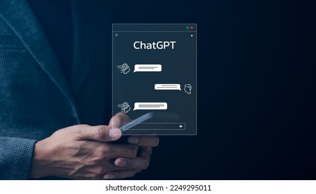 ChatGPT Chat with AI or Artificial Intelligence technology. businessman using smartphone chatting with intelligent artificial intelligence. Developed by OpenAI. Futuristic technology. automate chatbot - Shutterstock ID 2249295011