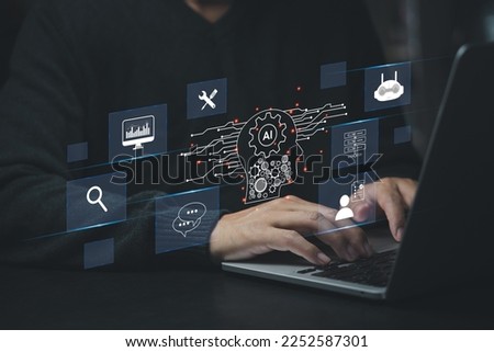 ChatGPT Chat with AI or Artificial Intelligence. Digital chatbot, robot application, OpenAI generate. Futuristic technology, Man using laptop computer on virtual screen.