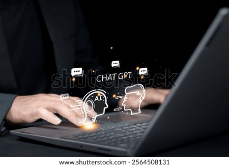 ChatGPT Chat with AI or Artificial Intelligence. Businessman chatting with a smart AI or artificial intelligence using an artificial intelligence chatbot developed by OpenAI.