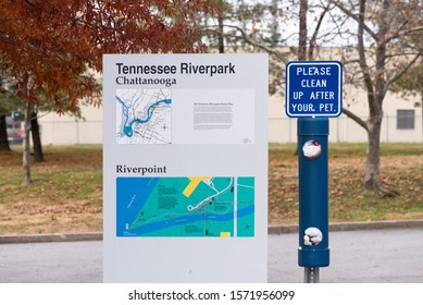 Chattanooga, Tennessee, USA // 11-27-19 : Information And Map Signage Located In Riverpark With Dog Waste Bag Station.