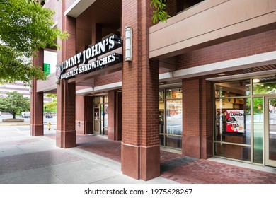 CHATTANOOGA, TN, USA-8 MAY 2021: A Jimmy John's Gourmet Sandwiches Deli In The First Floor Of A Commercial Building.  View Thru Glass To Interior, Sign.