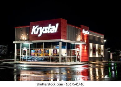 Chattanooga, TN-USA 2-21-2020: Remodeled Krystal Fast Food Restaurant Late At Night With Light Streaks From A Car Going To The Drive Thru With Contrast And Reflections. 