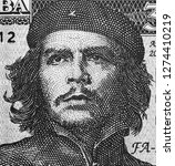 Che Guevara face portrait on Cuba banknote macro. Communist revolutionary, icon of Cuba revolution, communism, marxism.